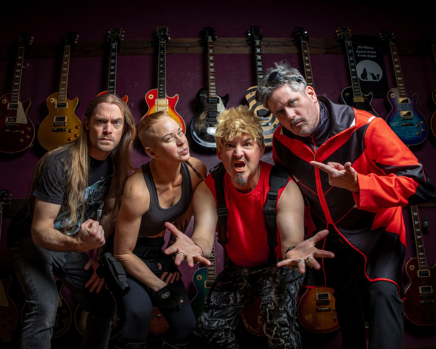 The full band, eyes to camera