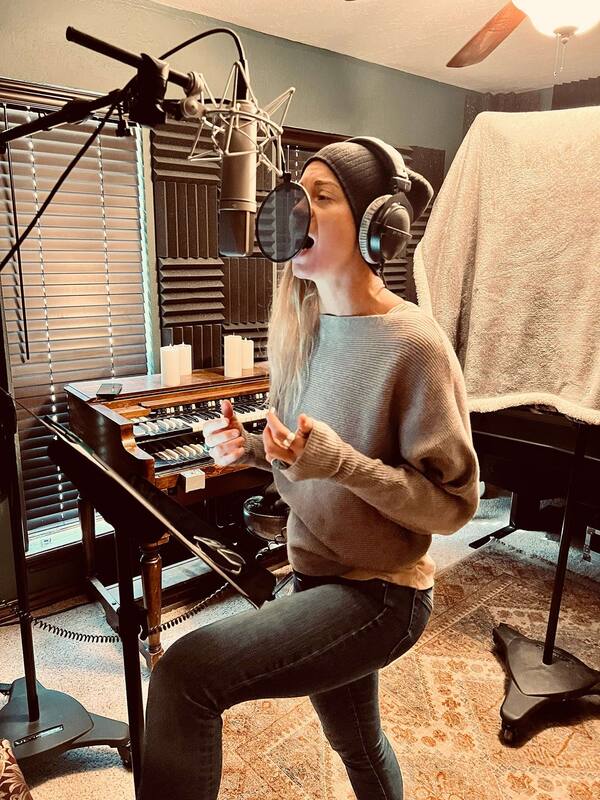 Lacy Saunders in the booth